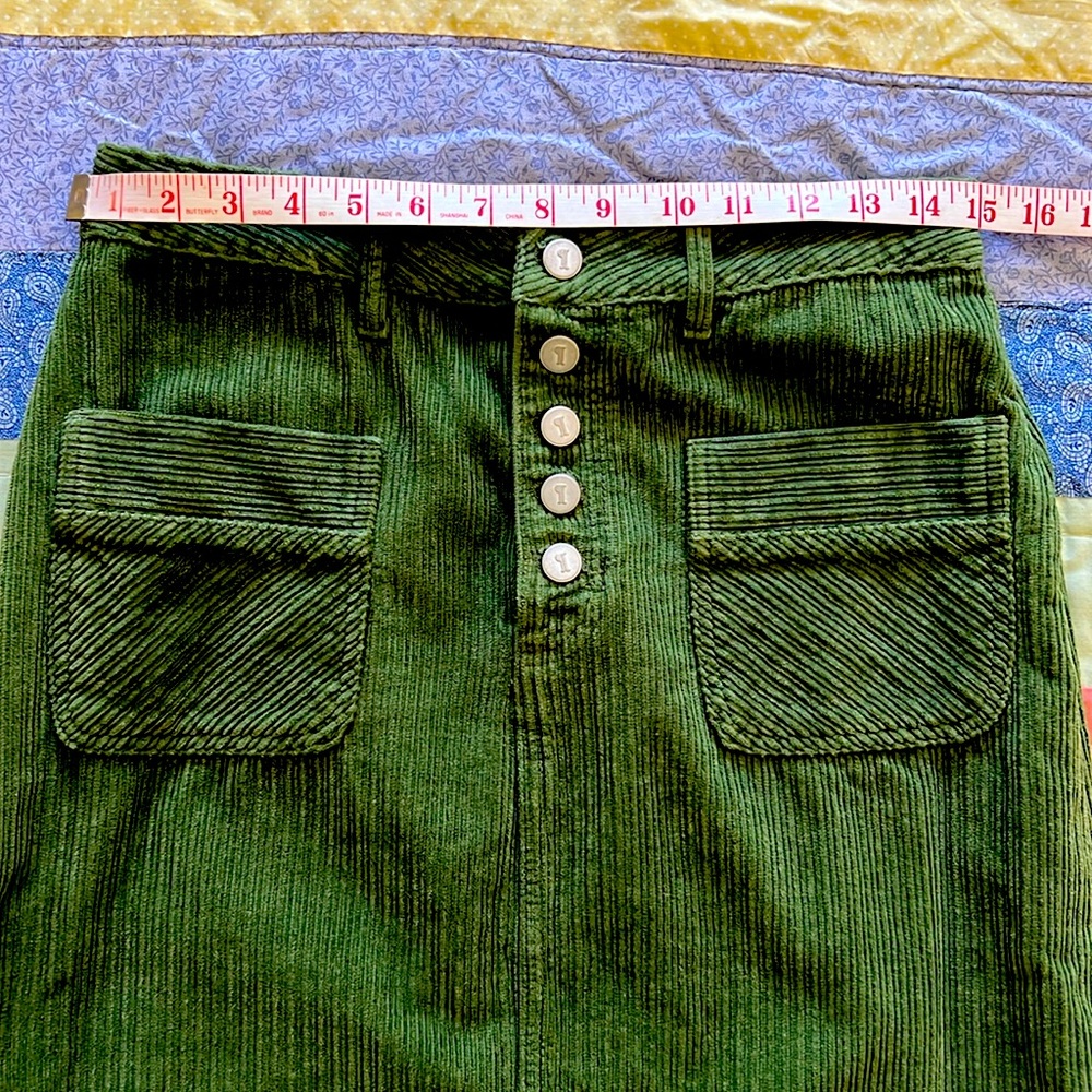 Anthropologie mid-length corduroy green skirt size 8